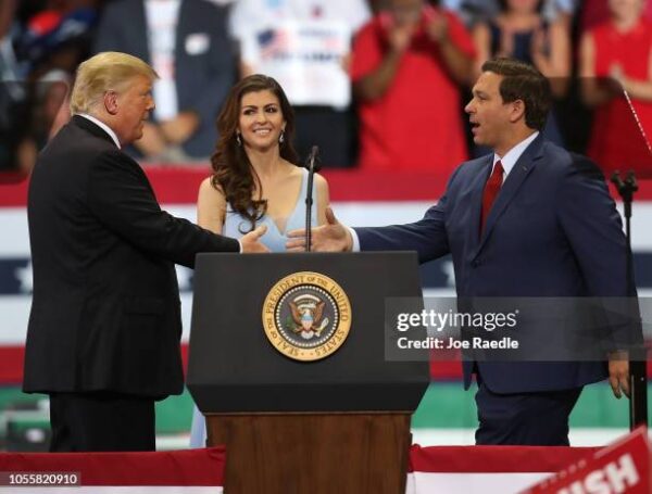 Florida Governor Ron DeSantis Gifts President Trump Custom Coin at Campaign Event